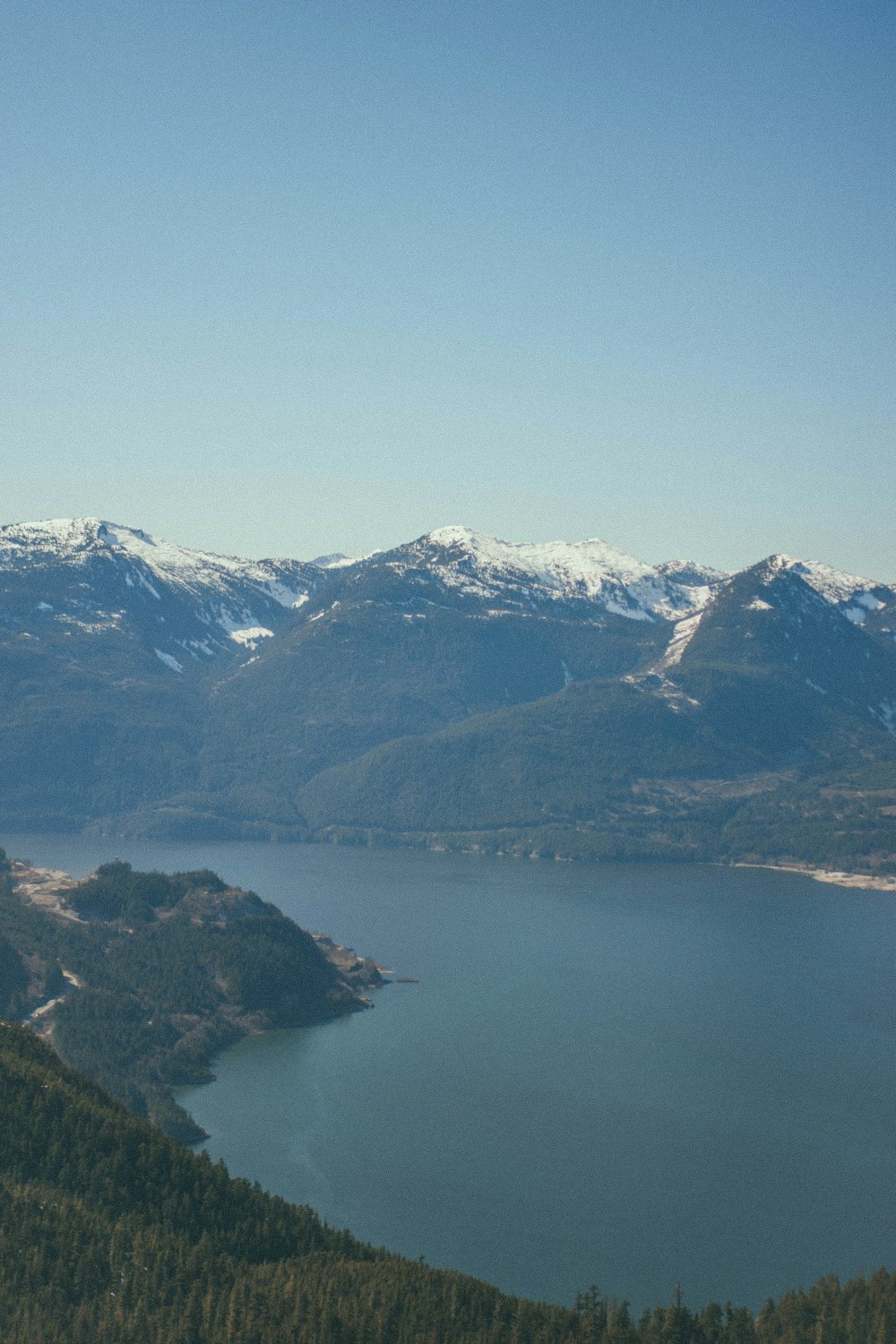 a large body of water surrounded by mountains