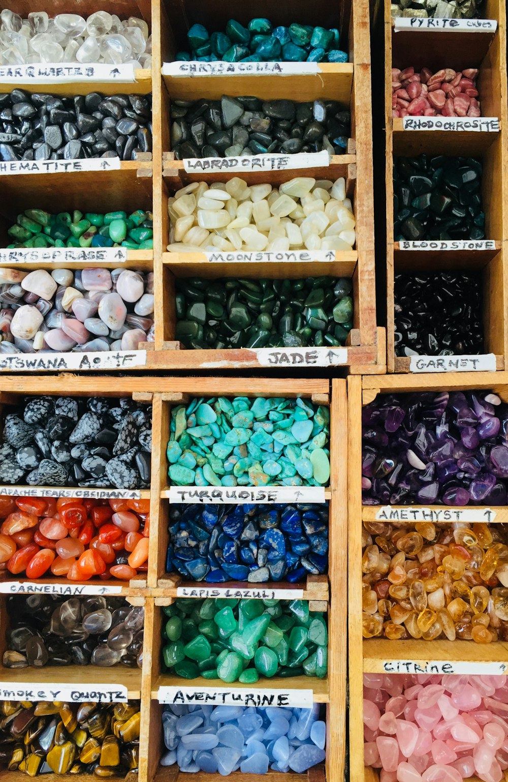 assorted-color gemstone lot on rack