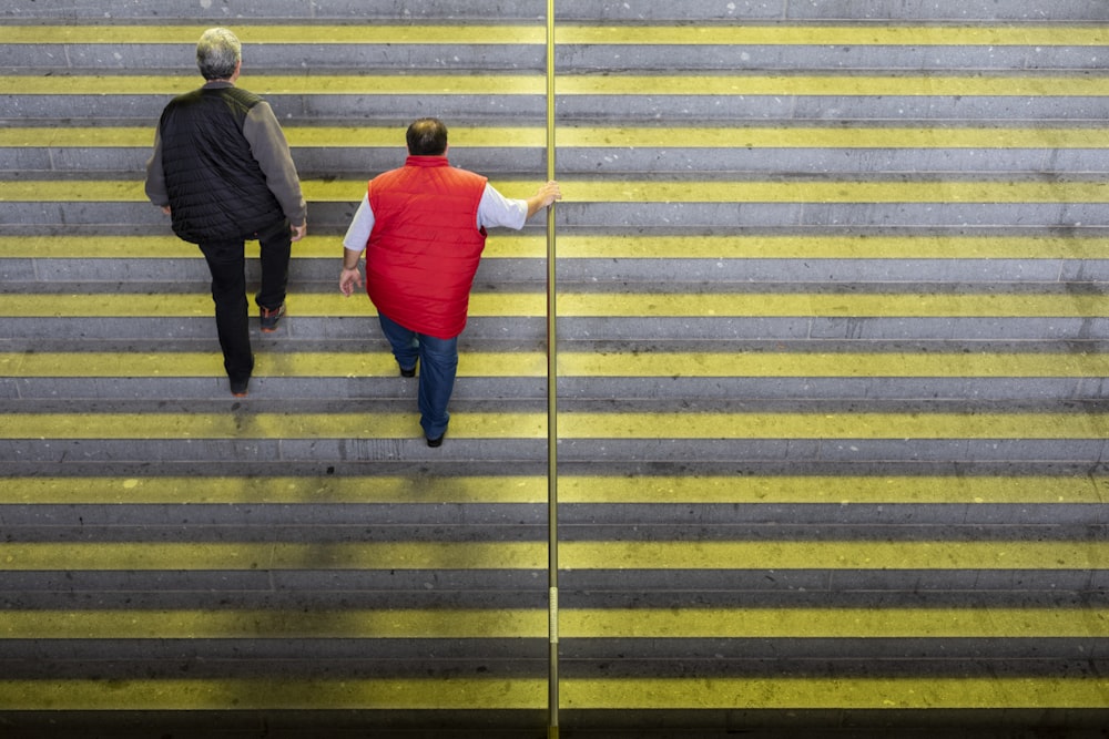 people walking on staircase during daytime