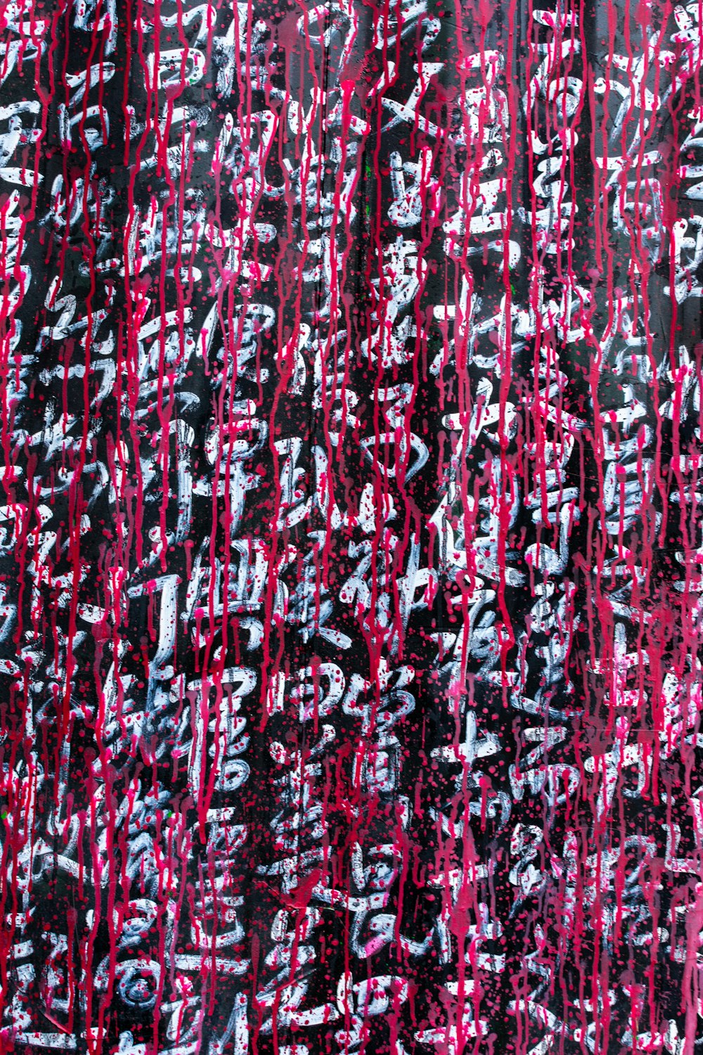 pink, black and white textile