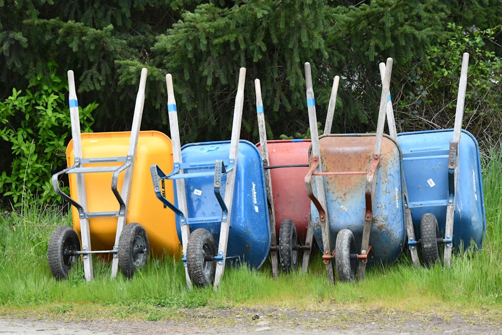 assorted colour wheelbarrows