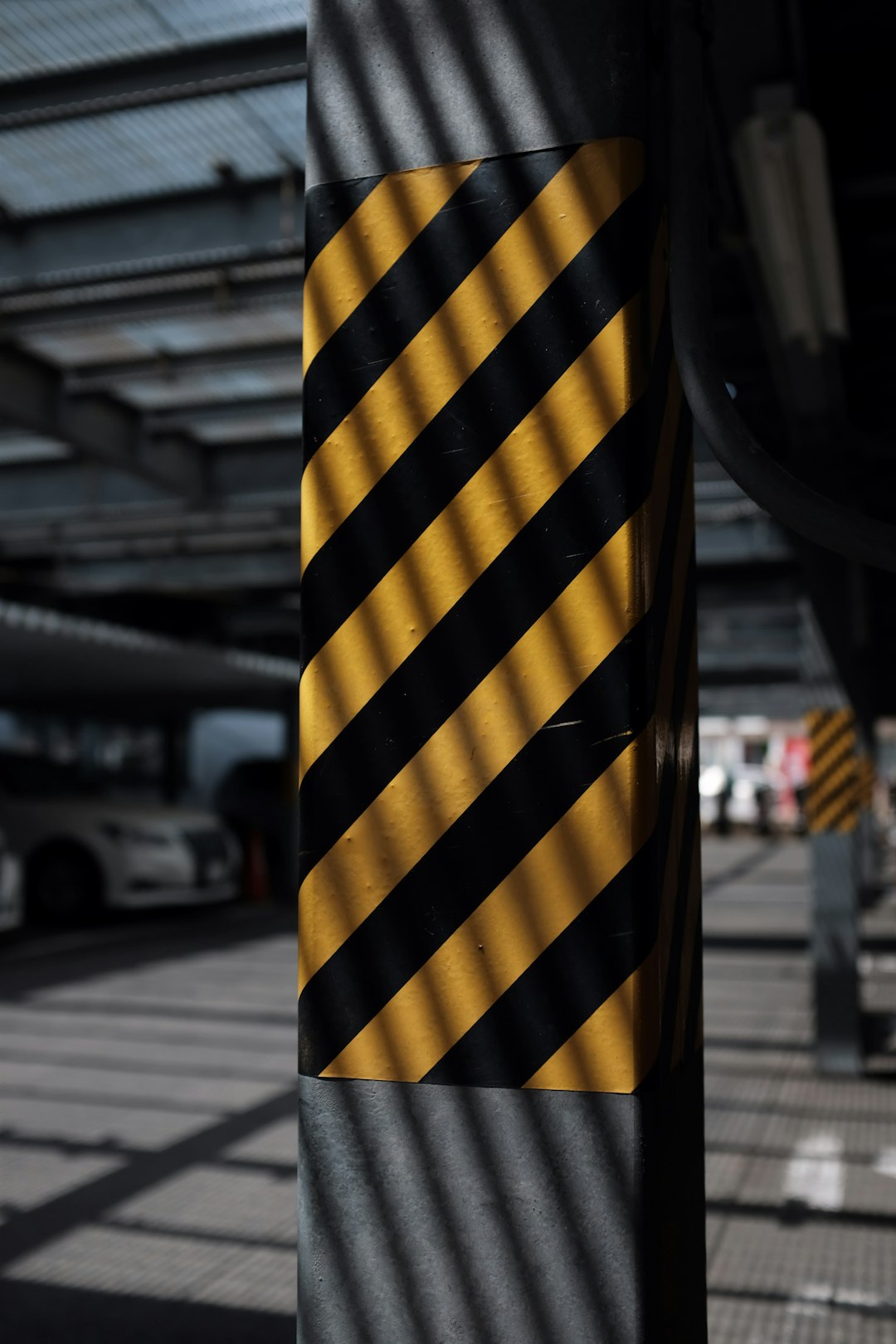 yellow and black striped post