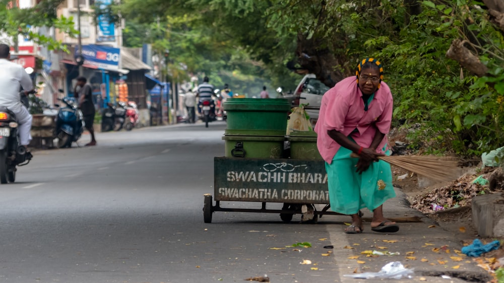woman cleaning street