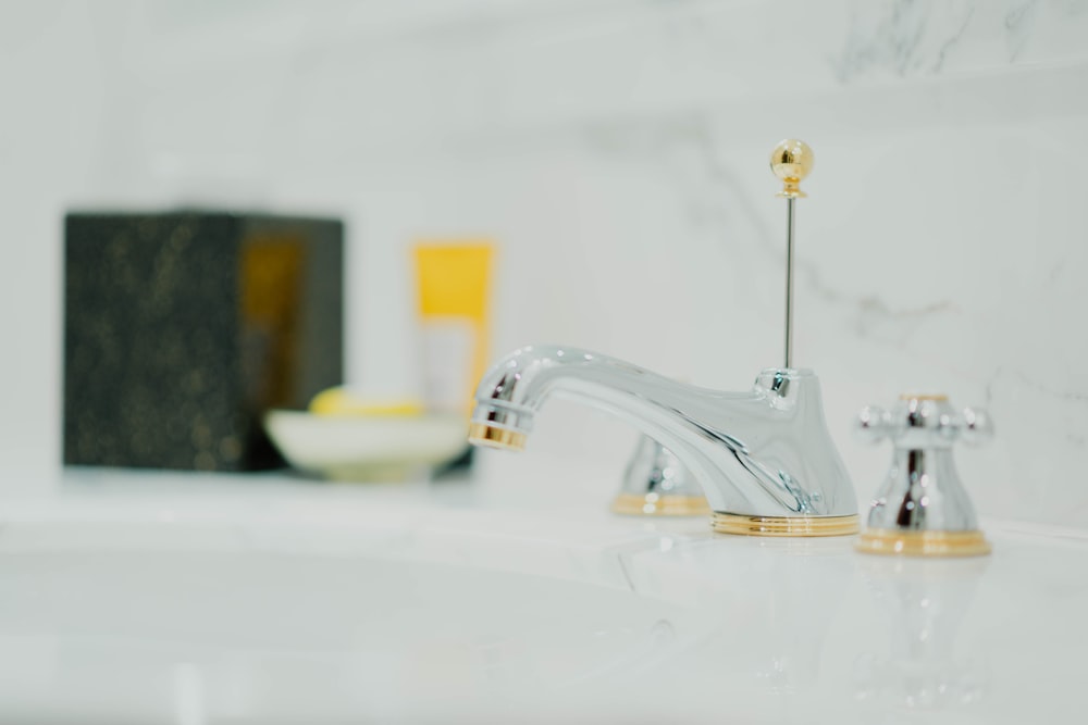 grey metal faucet