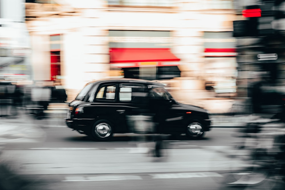 timelapse photography of black car on road