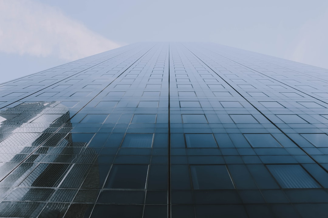 low-angle photography of high-rise building with curtain wall