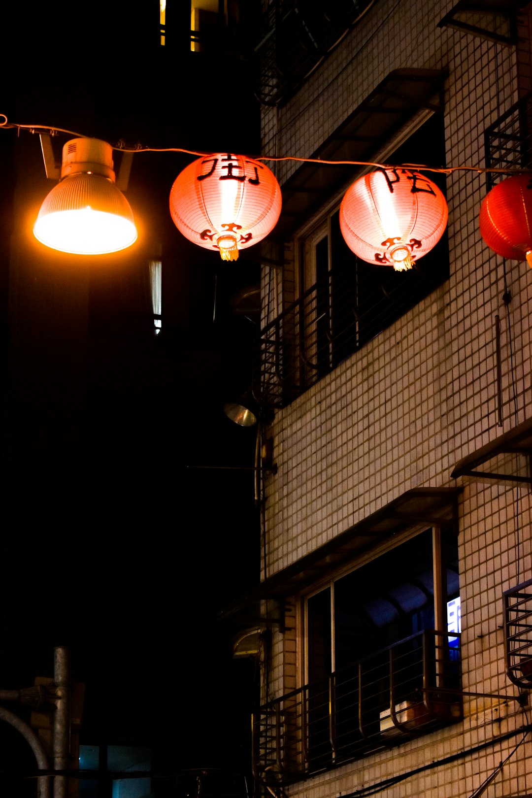 lighted hanging red Chinese lanterns