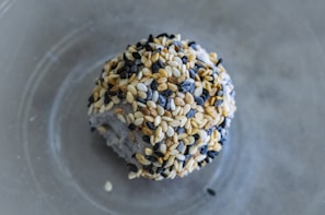 A display of sesame seeds used in various culinary applications.