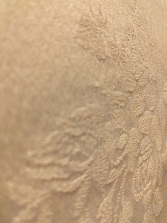 Close-up of soft fabric textures and patterns on kids' clothing.