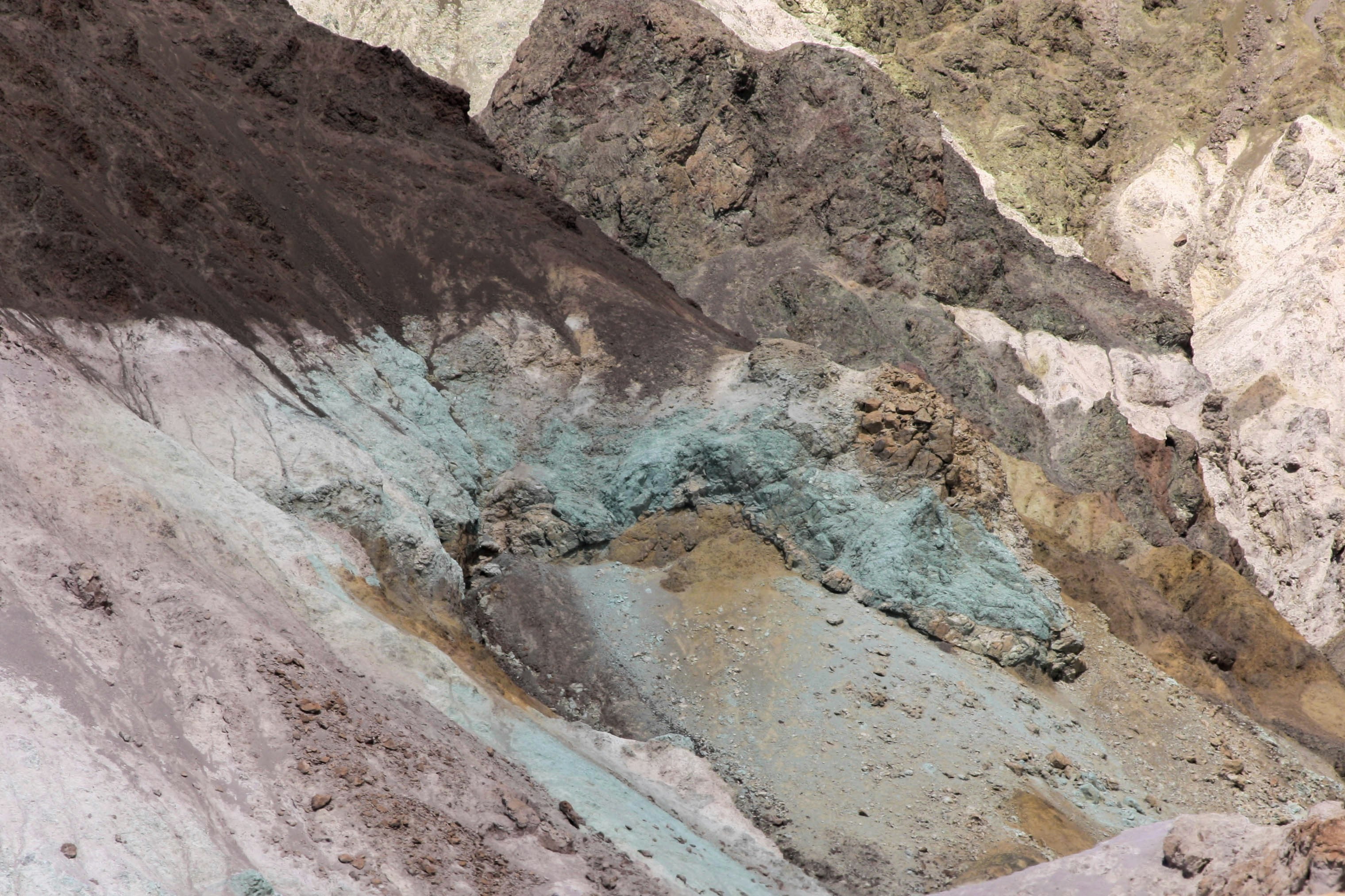 brown hill during daytime