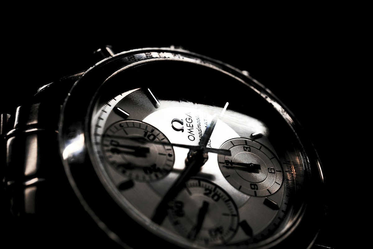 Omega chronograph photograph illustrating a multi-register dial; exact functions vary by reference.