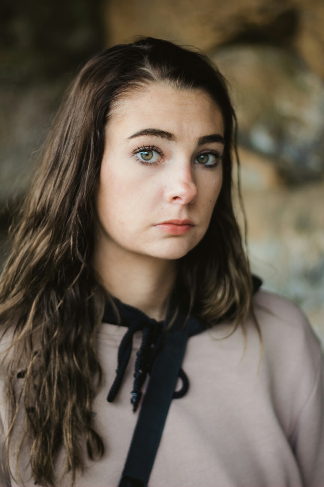 woman wearing grey top