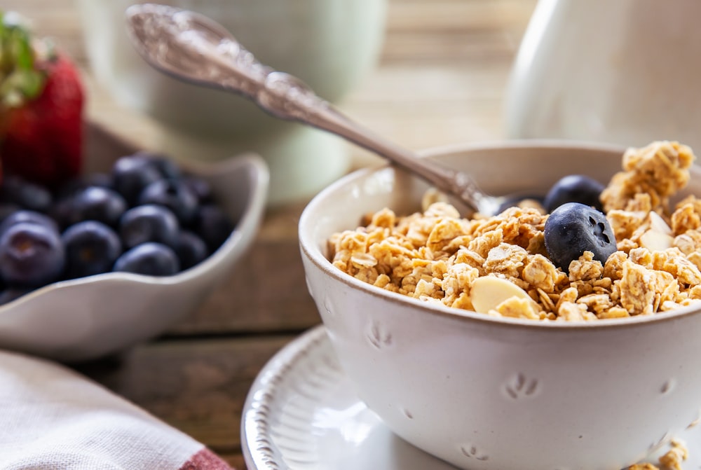 oat with blueberries on white ceramic bowl