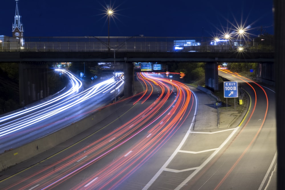 time lapse photography of cars on road during night time