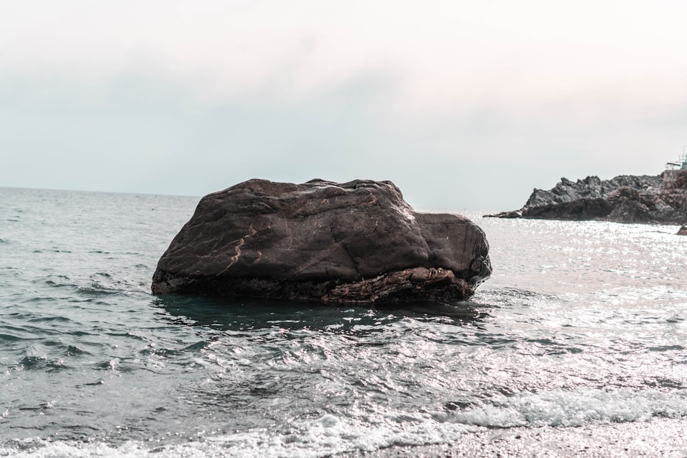 gray rocks on water