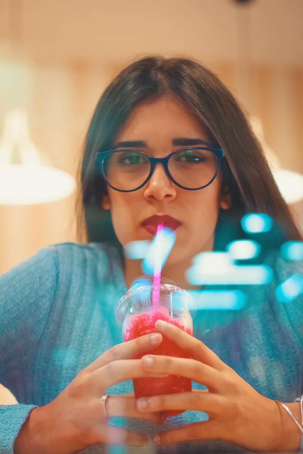 woman sipping straw