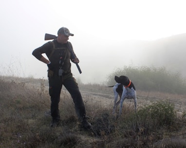 man looking at his dog