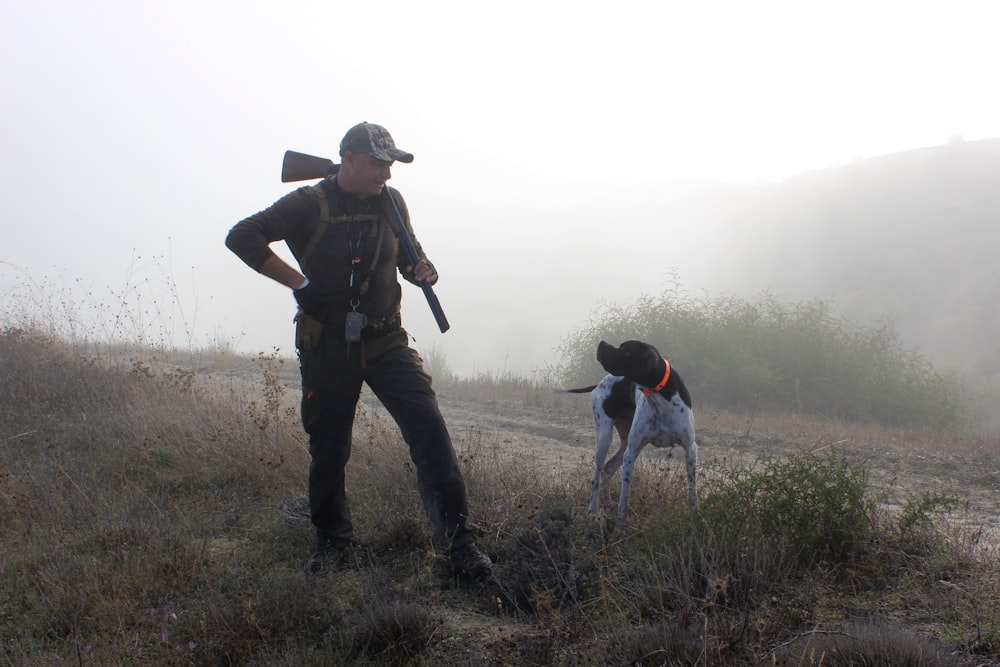 man looking at his dog