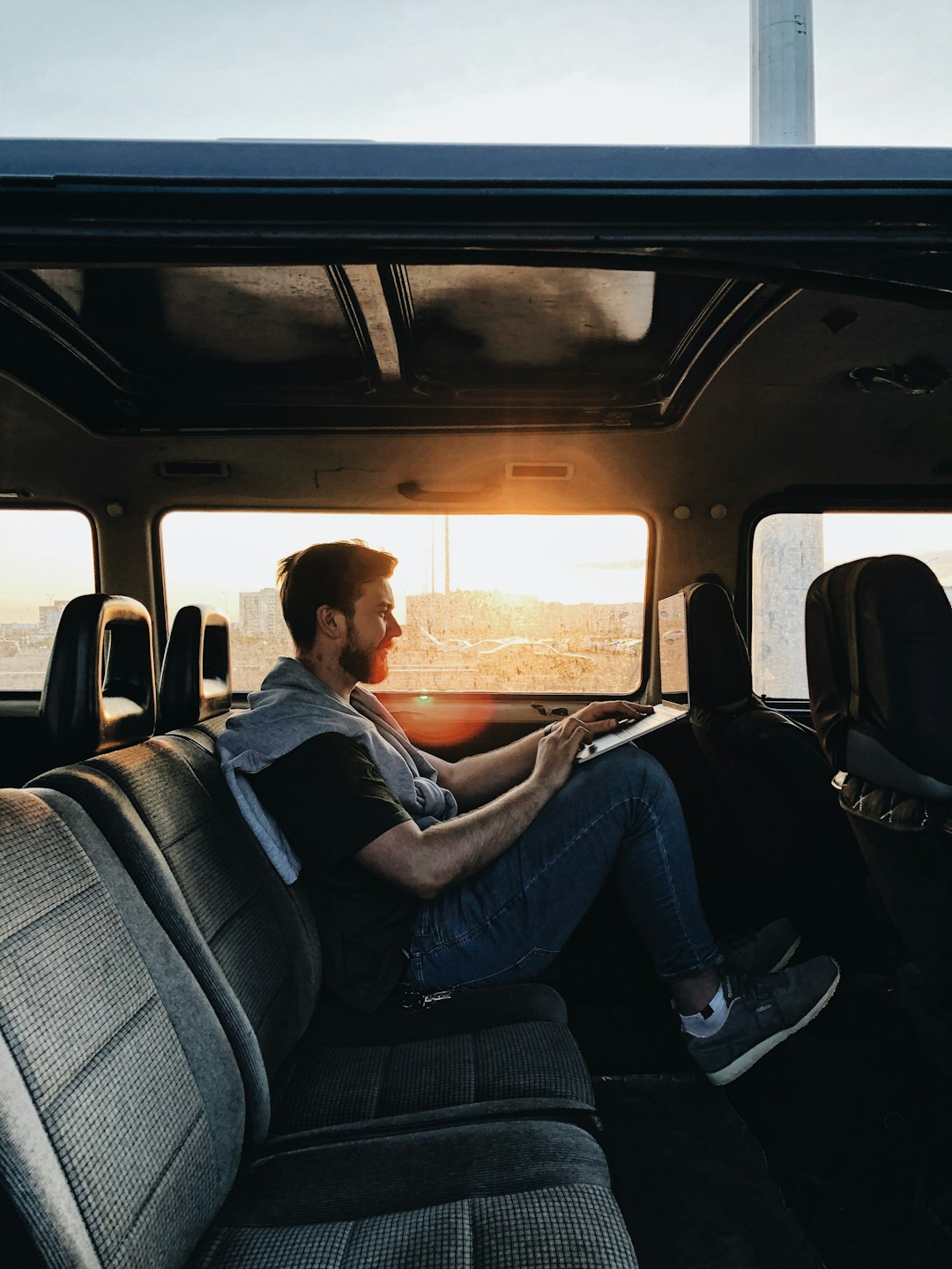 man siting inside vehicle