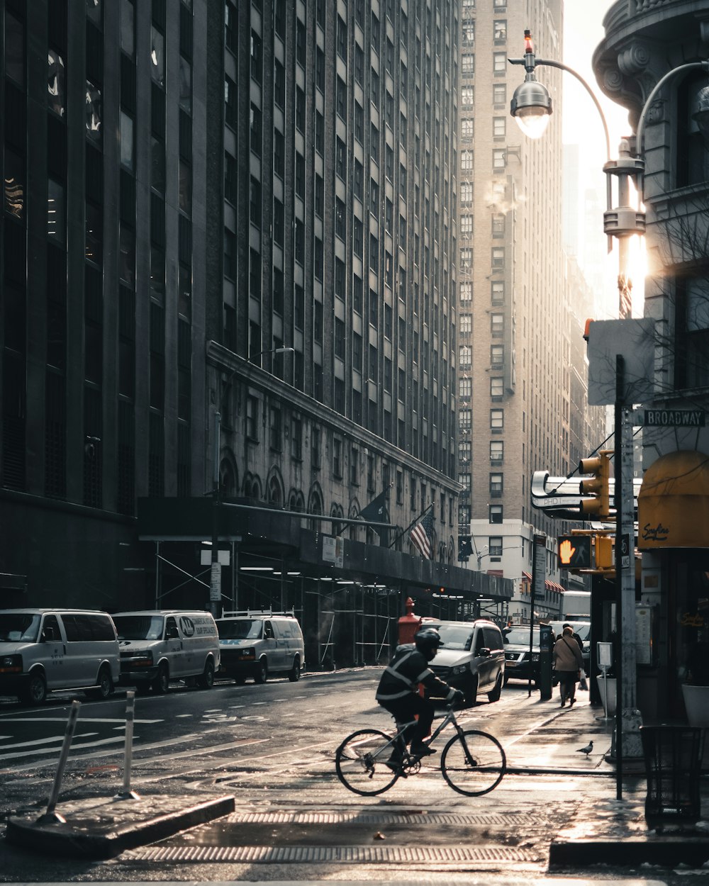 man on bicycle near building