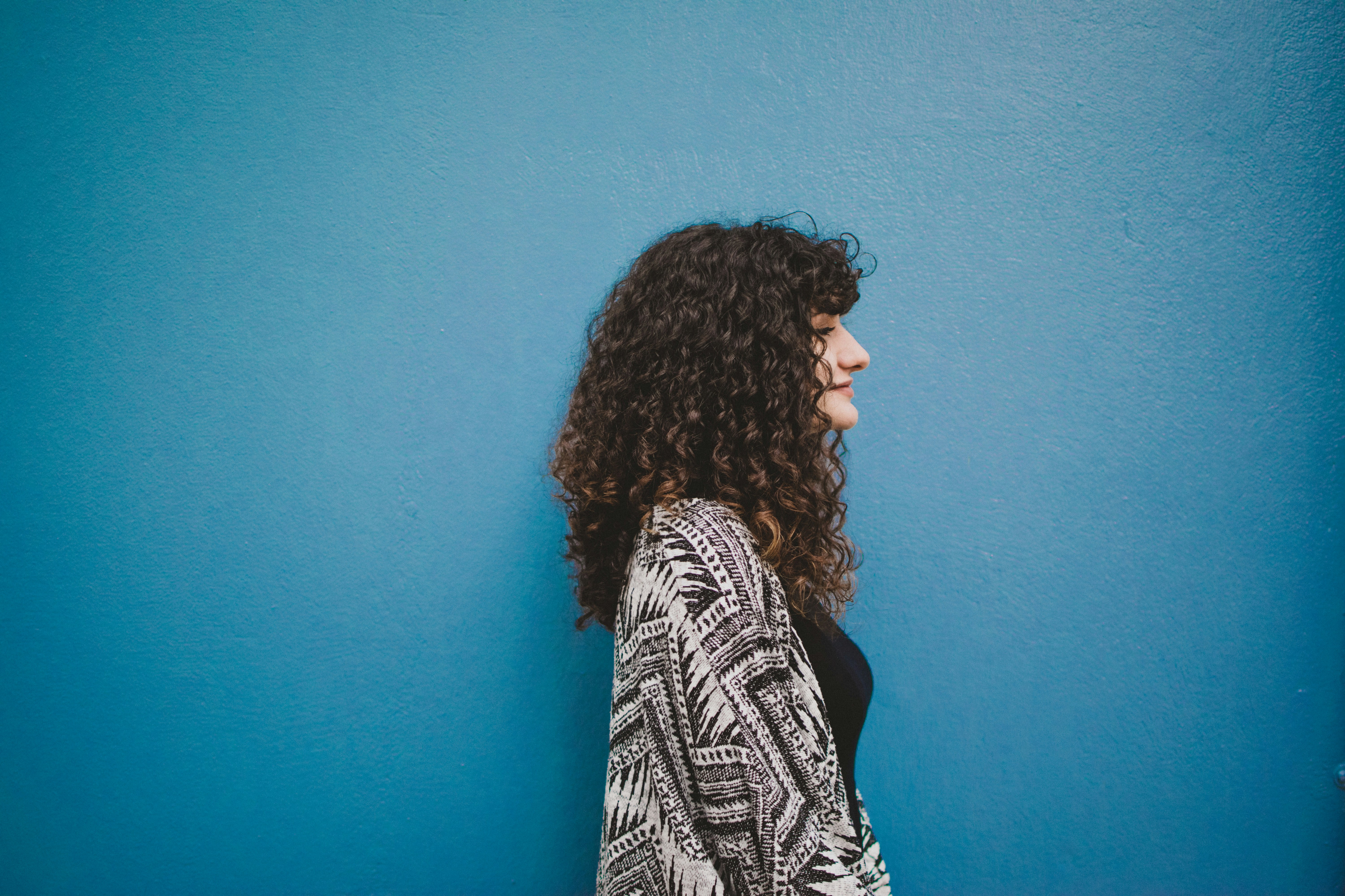 a woman with healthy hair used a bonding treatment