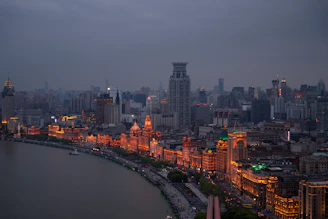 high-angle photography of high-rise buildings beside beach