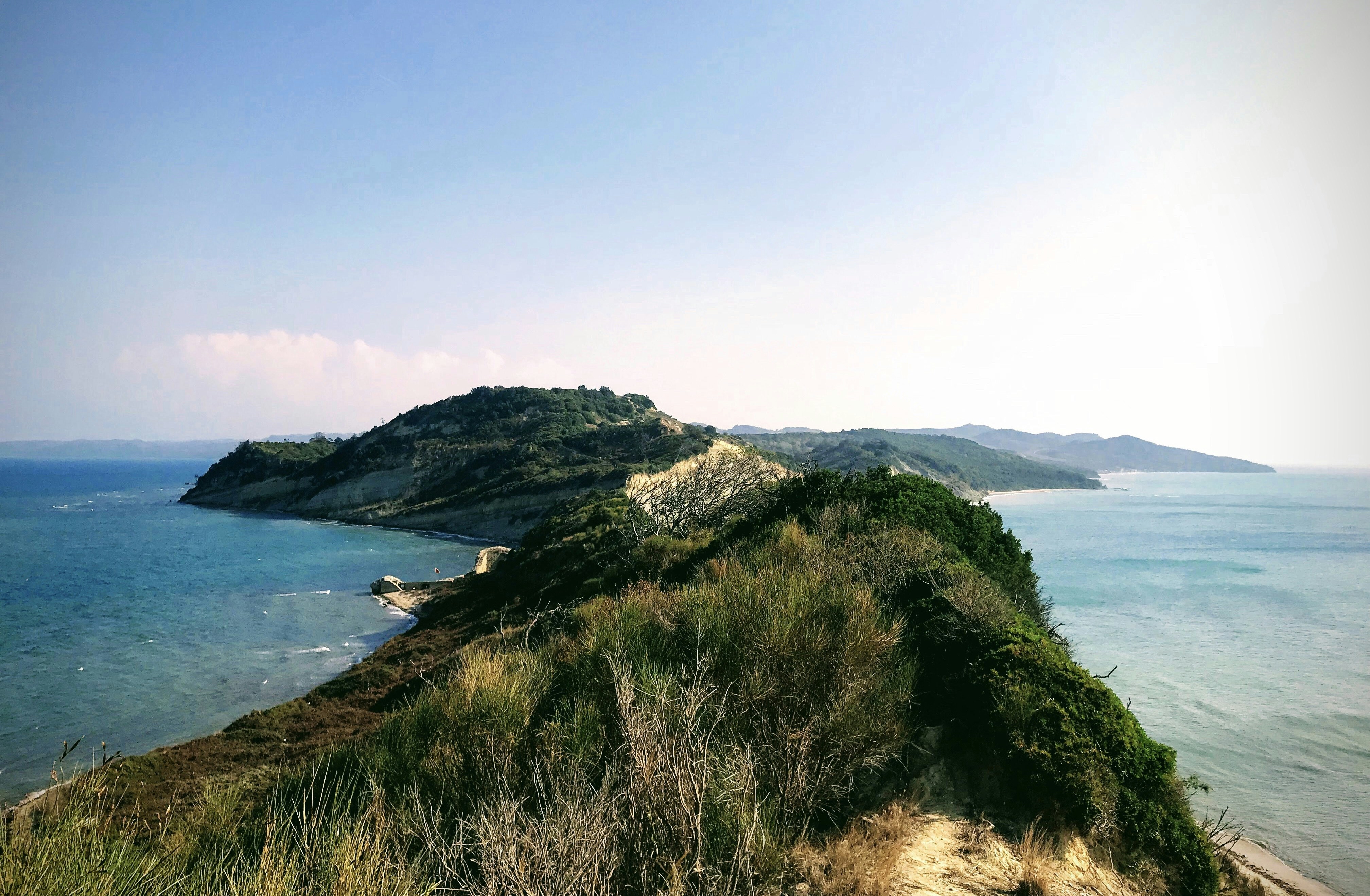 mountain near ea under blue sky, Cape of Rodon