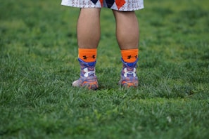 Close-up of a colorful knee-high sublimation sock with a dynamic athletic pattern