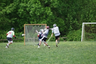 A welcoming contact page featuring a lacrosse field.