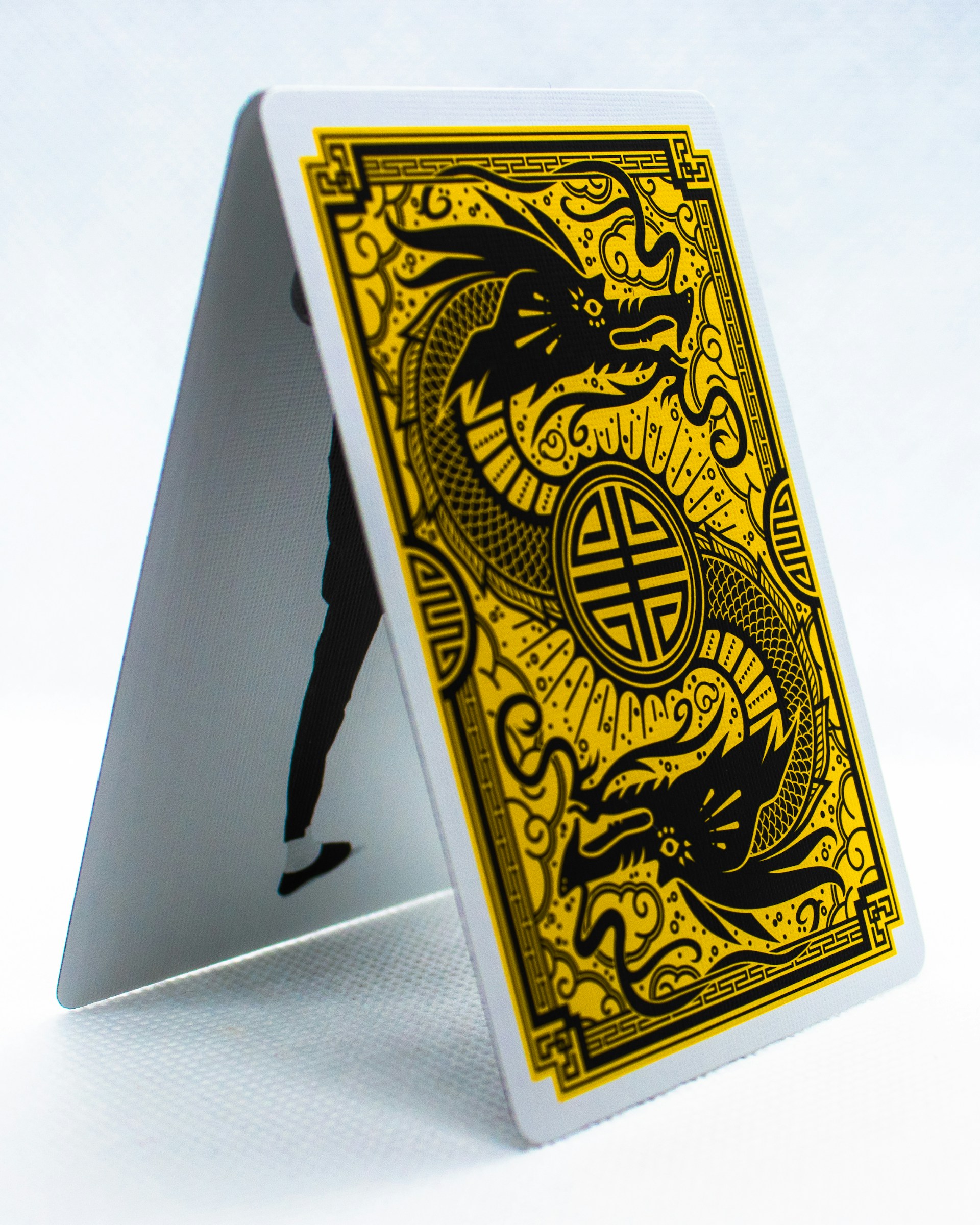 An exciting moment of a mahjong ways game win, with golden dragons swirling around the reels.