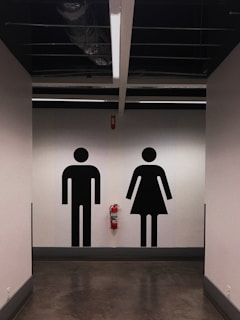 man and woman sign