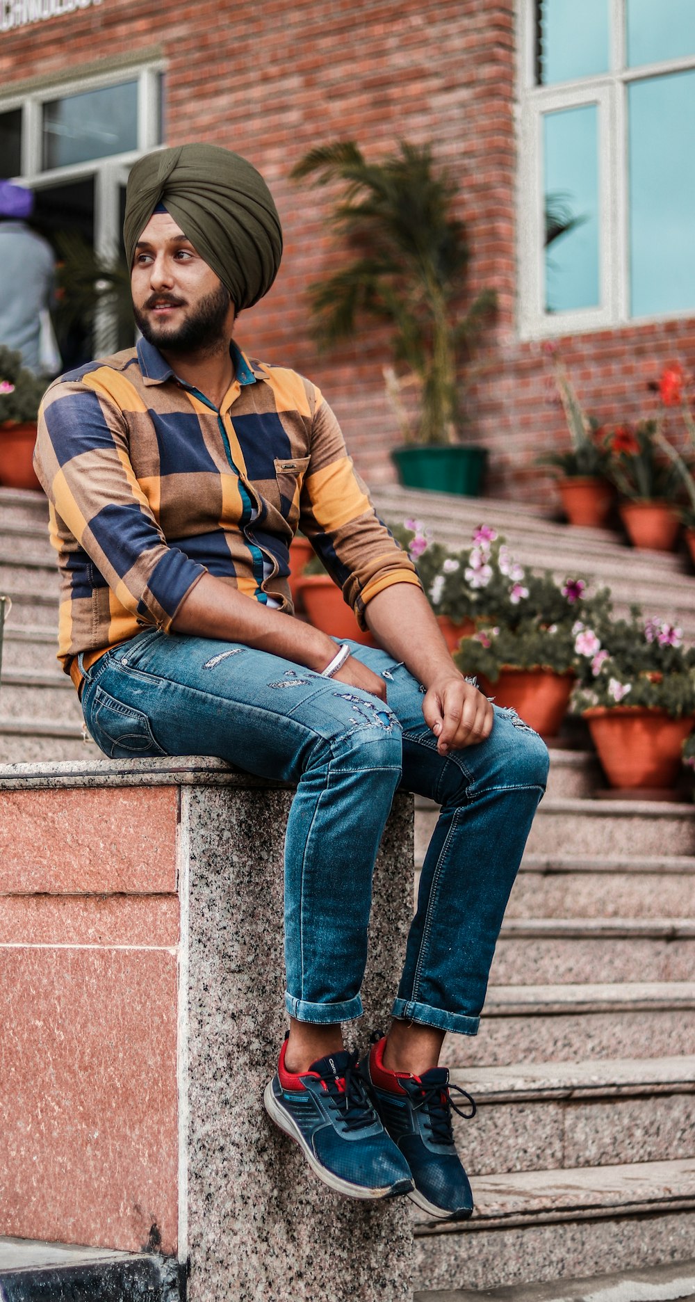 man wearing blue denim jeans