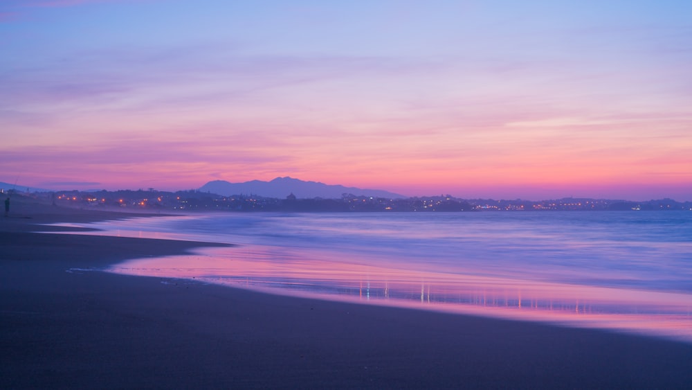 body of water during golden hour