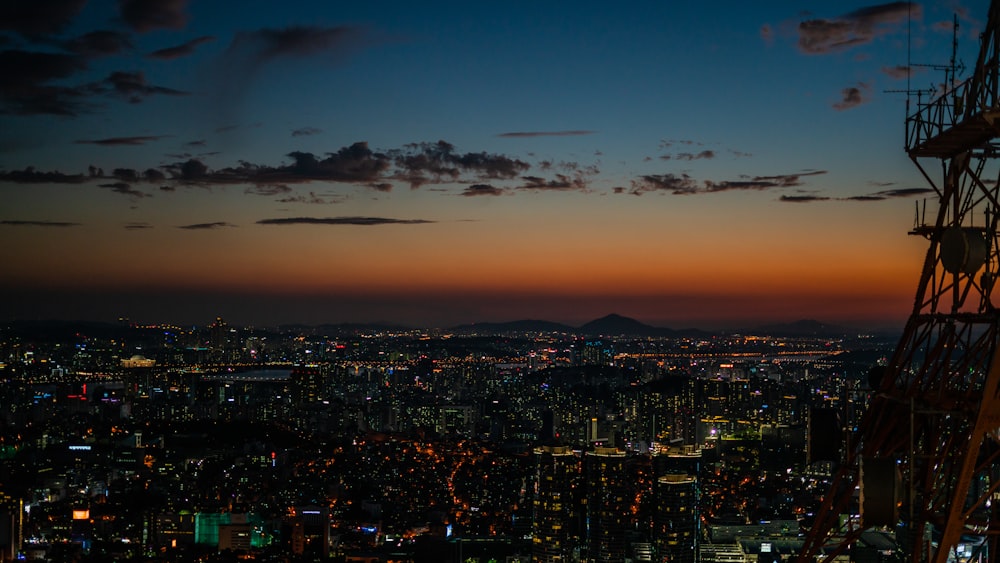 city with high-rise buildings during night time