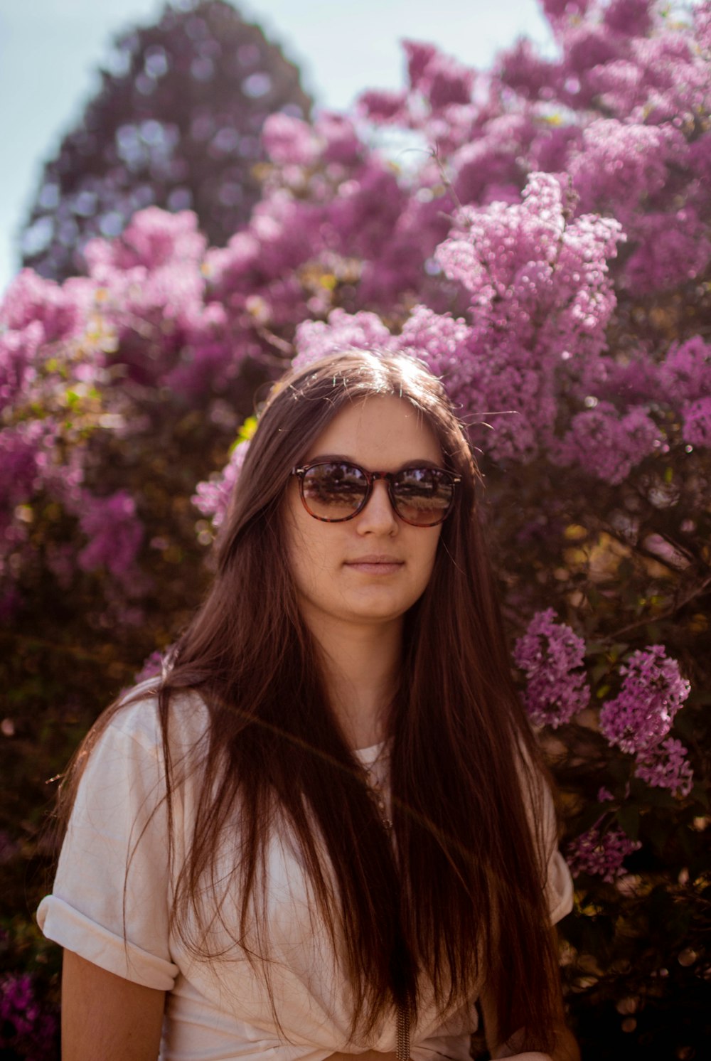 woman wearing brown sunglasses