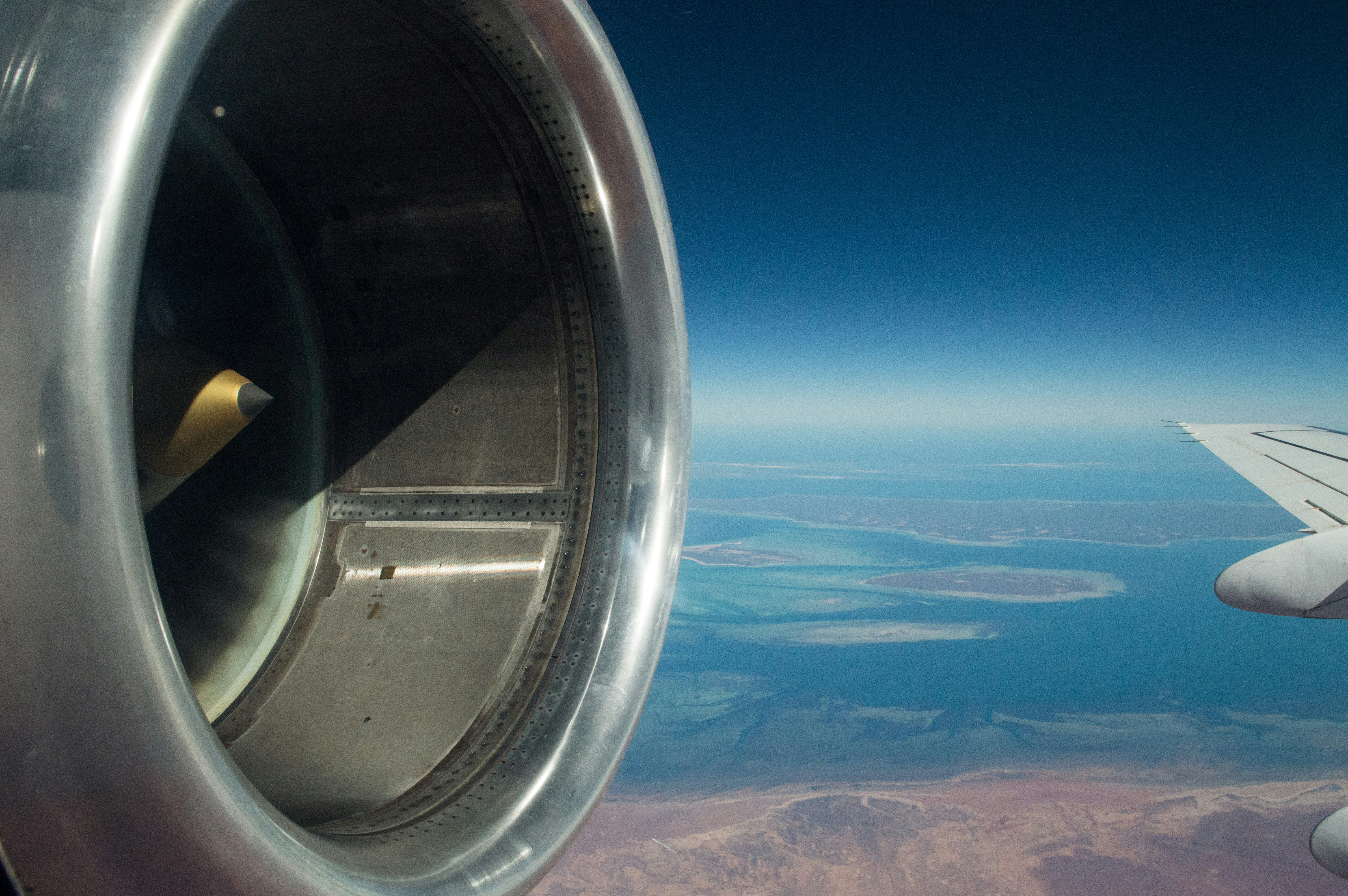 grey and white airplane, Perth (PER) to Exmouth (LEA) flight - Fokker 100