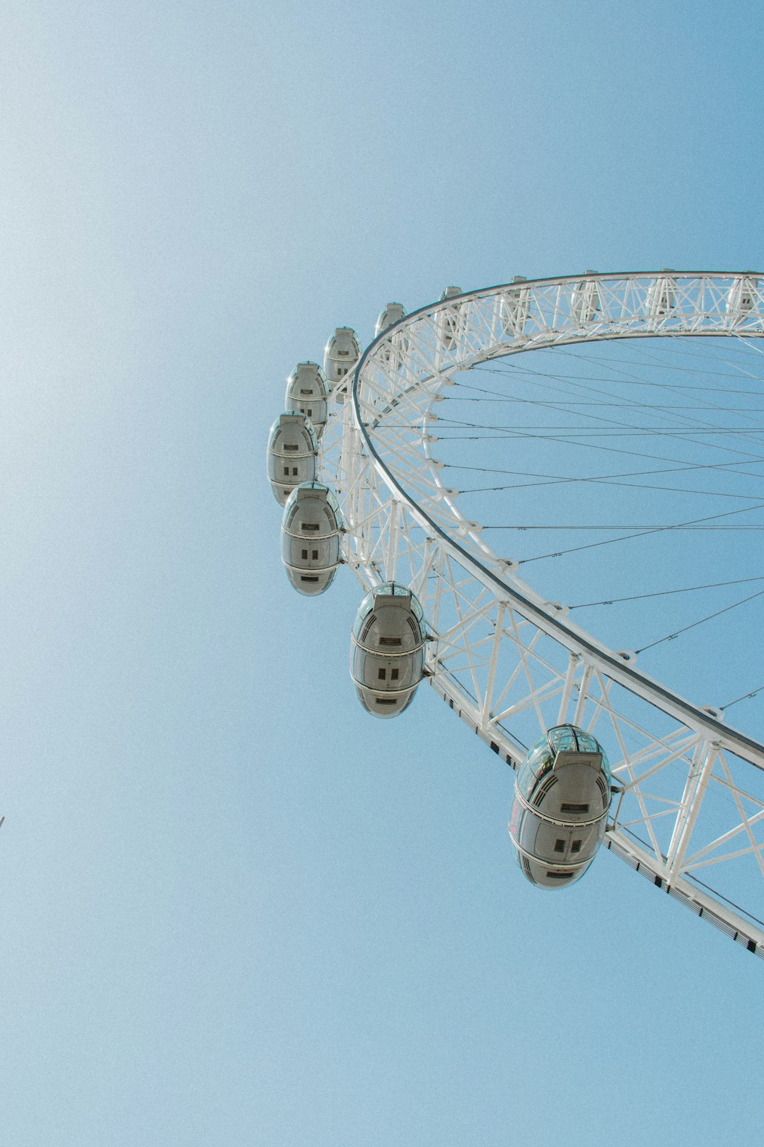 low-angle photography of white ferris-wheel