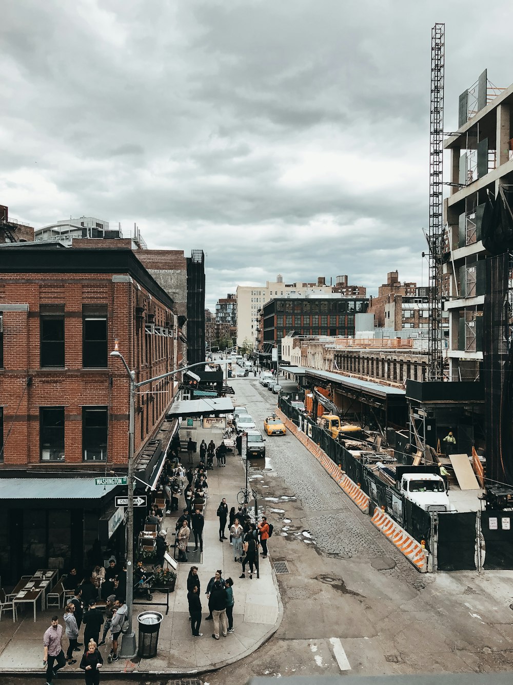 people walking on sidewalk during daytime