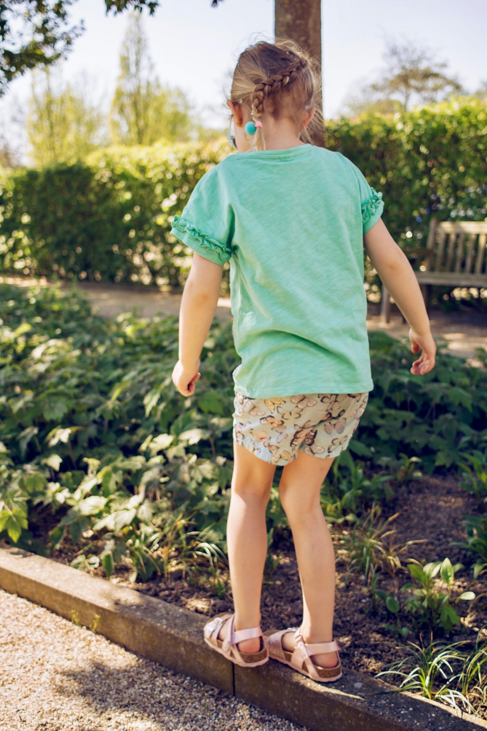 girl in green short-sleeved shirt