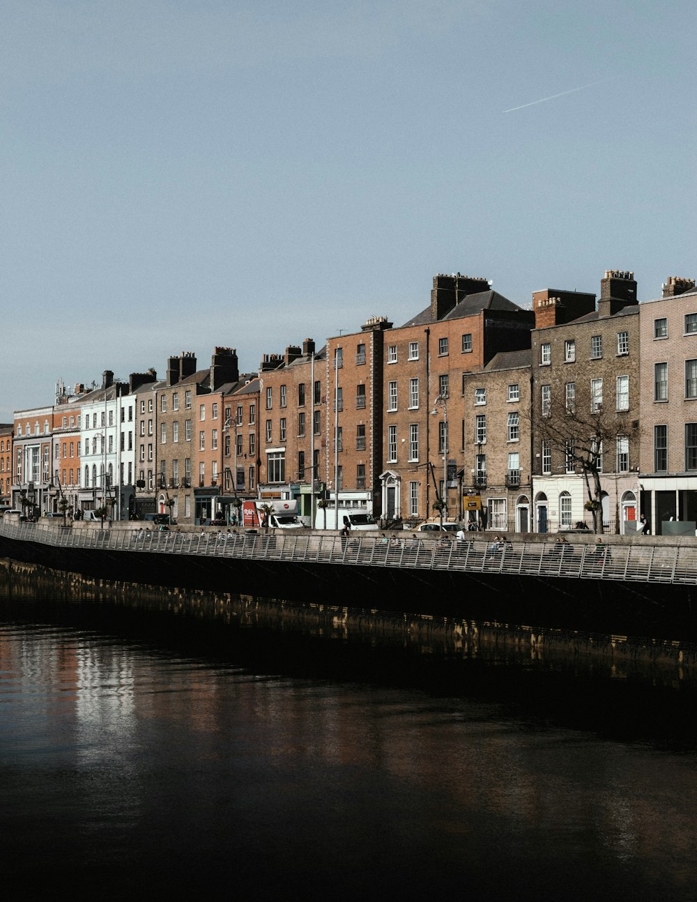 cars on roadway beside building