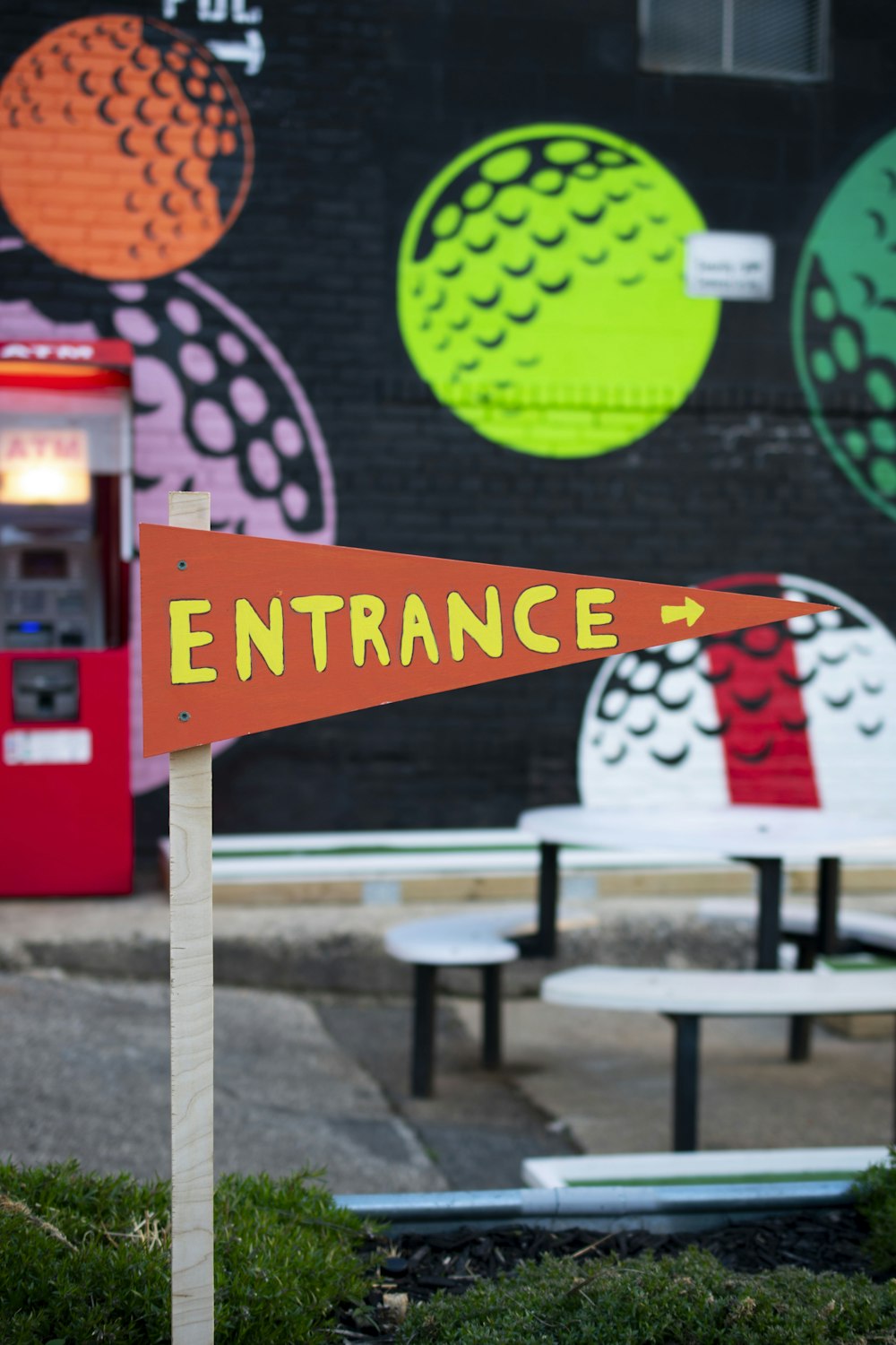 red and yellow entrance signage