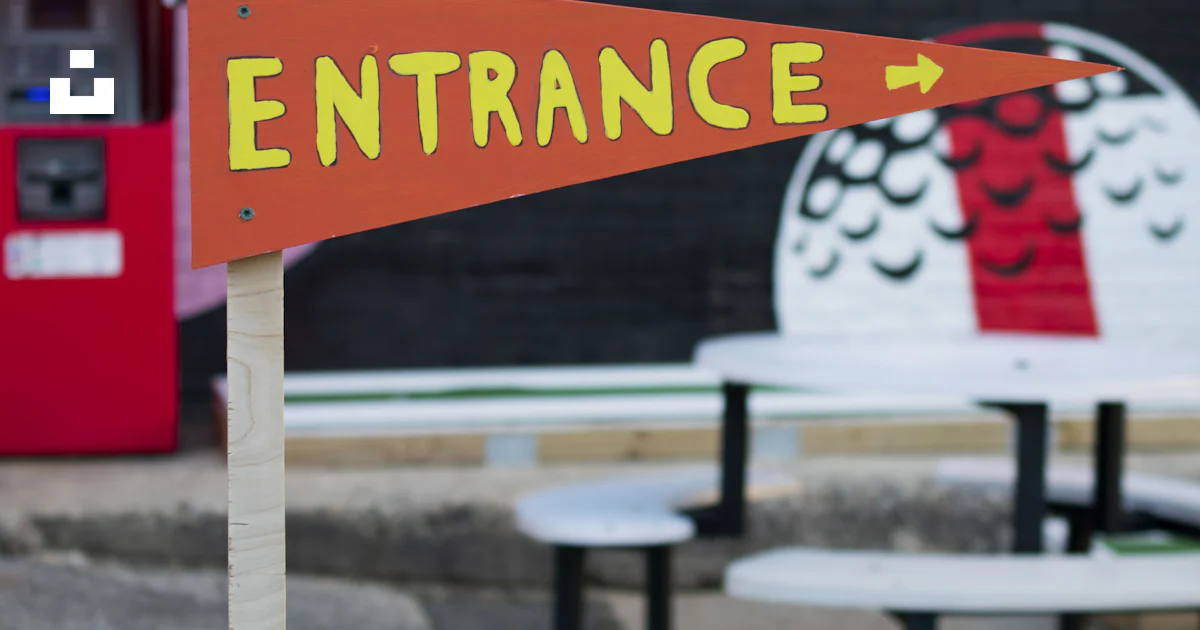 Red and yellow entrance signage photo – Free Philadelphia Image on Unsplash