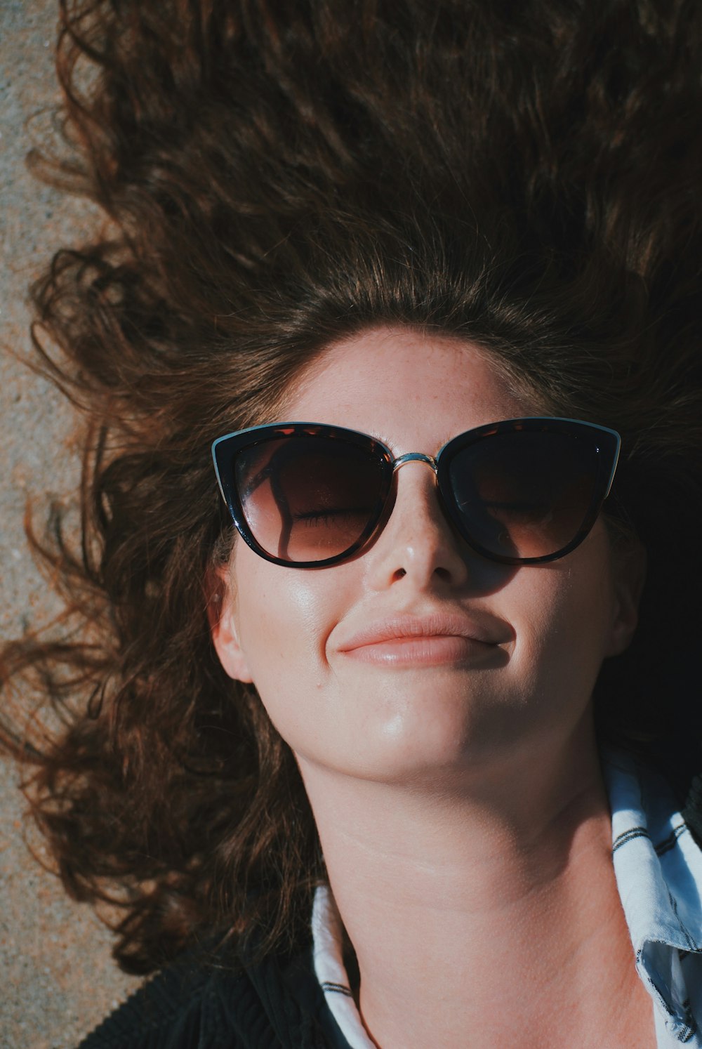 woman wearing black sunglasses