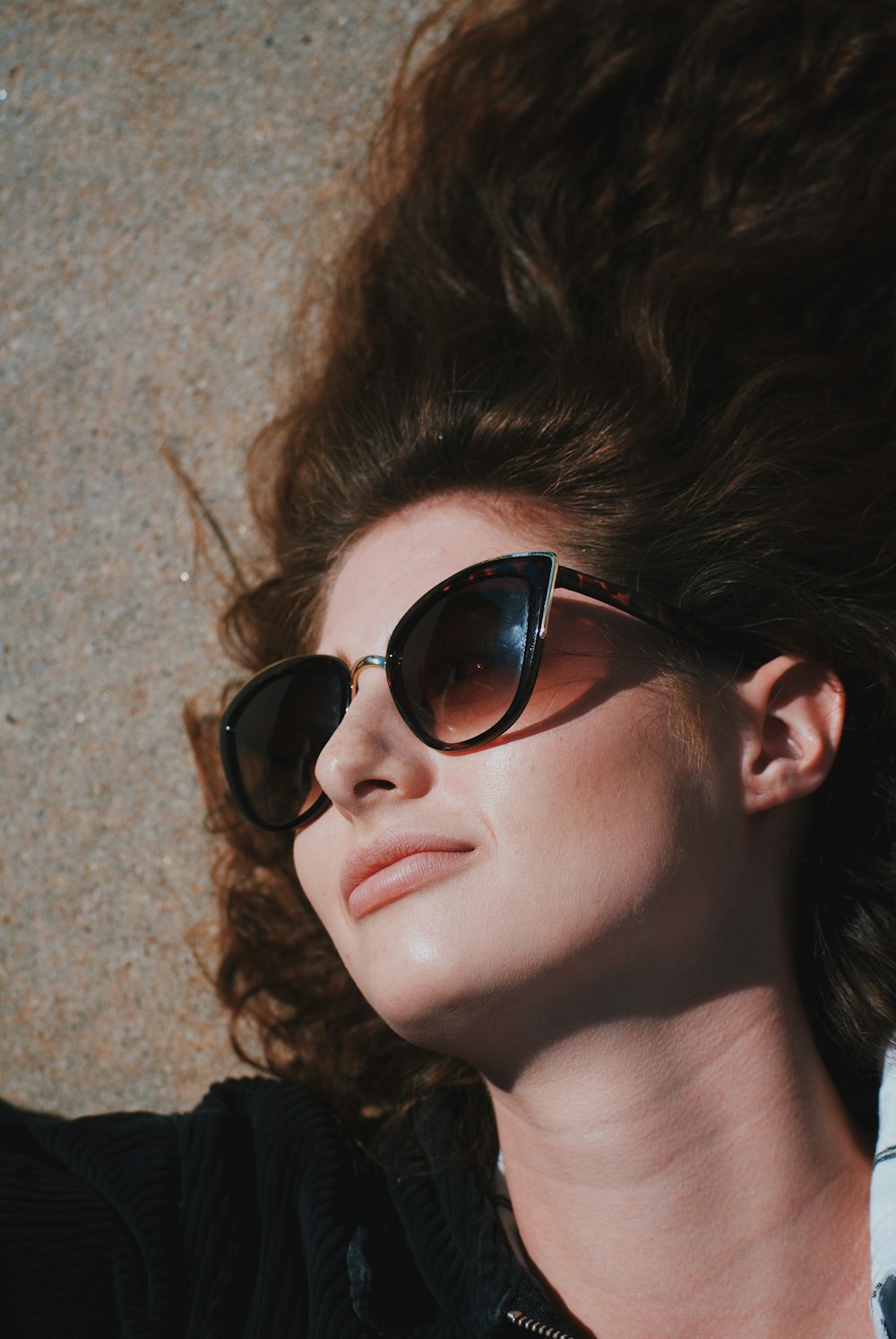woman wearing black framed sunglasses