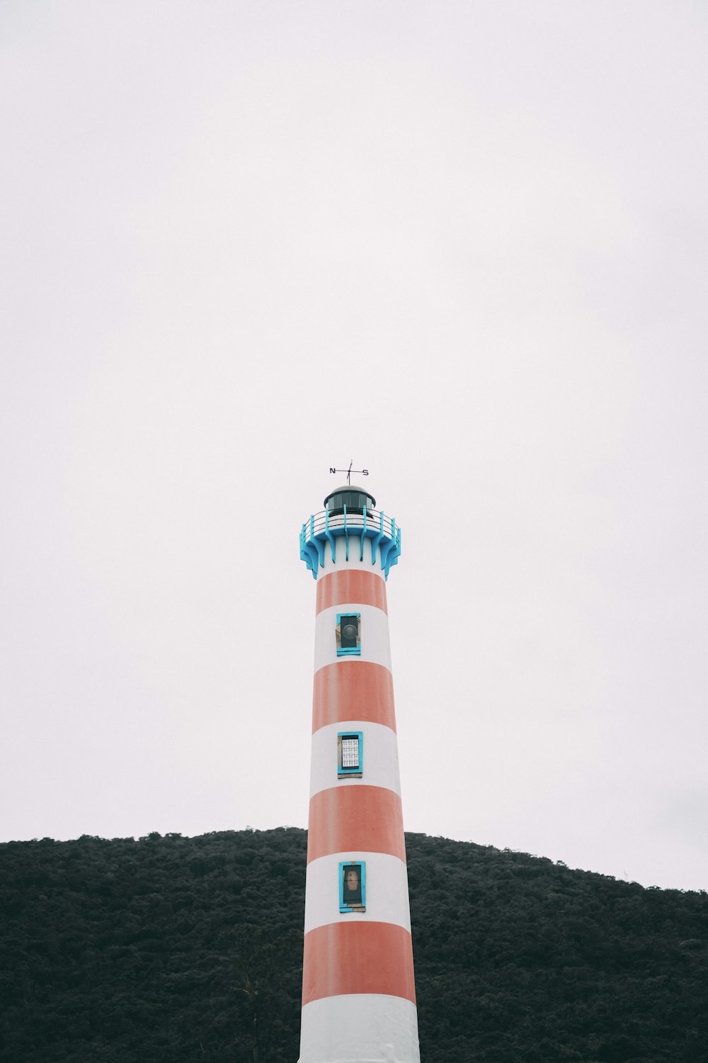 red and white striped lighthouse