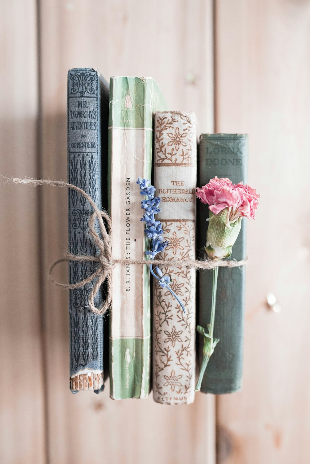 four assorted-title books