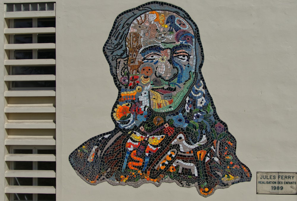 multicolored mosaic of man's profile