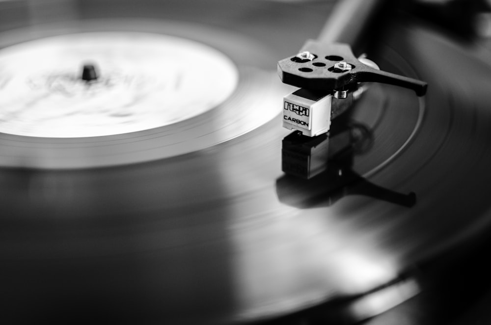 grayscale photography of turntable