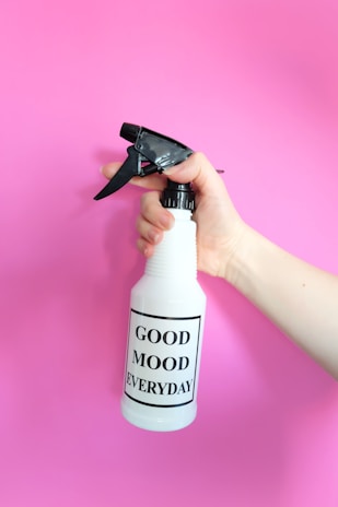 white and black spray bottle