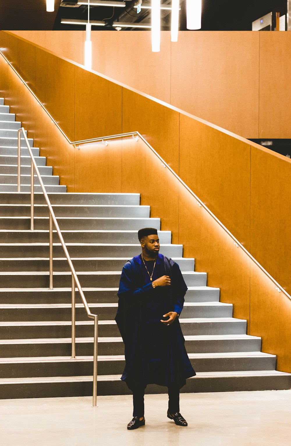 man standing near stairs